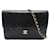 Chanel Bolso bandolera acolchado CC con solapa Negro Piel de cordero  ref.1312590