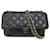 Faltbare Einkaufstasche aus schwarzem Nylon mit Graffiti-Motiv von Chanel mit Kaviarklappe Leder  ref.1314117