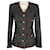 Chanel Giacca in tweed nero con bottoni gioiello CC leggendari.  ref.1315214