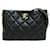 Chanel Umhängetasche aus gestepptem CC-Leder mit Kette Schwarz Lammfell  ref.1317125