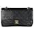 Chanel vintage 24Petit sac à rabat classique doublé en cuir d'agneau matelassé noir K  ref.1319296