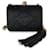 Pochette boîte à pompons CC en satin matelassé noir Chanel Tissu  ref.1319375