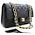 Chanel Classic gefütterte Klappe 10"Chain Shoulder Bag Black Lambskin Schwarz Leder  ref.1320421