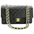 Chanel black 2000-2002 sac à rabat doublé Classic en cuir d'agneau moyen Noir  ref.1323560