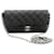 Chanel black 2021 pochette de téléphone argentée Cuir Noir  ref.1330359