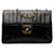 Bolsa de ombro Chanel Jumbo Vertical Quilt em pele de cordeiro preta com aba única Preto Couro  ref.1351218