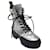 Autre Marque Louis Vuitton Silver Metallic Patent calf leather Spaceship Laureate Platform Desert Boots Silvery  ref.1354726