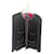 Cambon Veste en tweed de laine noire CHANEL 19b rare avec garniture de chaîne dorée et bouton CC.  ref.1386359