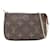 Brown Louis Vuitton Monogram Mini Pochette Accessoires Handbag Cloth  ref.1392185