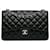 Bolso de hombro con solapa y forro de piel de cordero Chanel Jumbo Classic negro Cuero  ref.1392683