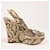 Dolce & Gabbana Compensées à plateforme en peau de serpent exotique - Taille 37 EU Cuir Beige  ref.1393510