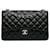 Solapa con forro de piel de cordero Black Jumbo Classic de Chanel Negro Cuero  ref.1394601
