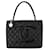 Tote preto do medalhão do caviar de Chanel Couro  ref.1398612