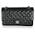 Timeless Chanel Black Quilted Lambskin Medium Classic Double Flap Bag Leather  ref.1415544