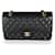 Chanel Black Quilted Caviar Medium Sac à rabat doublé classique Cuir Noir  ref.1415547