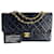 Chanel Classic handbag in black lambskin leather with gold-plated metal  ref.1416701