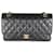 Timeless Chanel Black Quilted Caviar Medium Classic Double Flap Bag Leather  ref.1424380