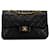 Schultertasche Chanel Medium Classic aus schwarzem Lammleder mit doppeltem Klappverschluss  ref.1443576