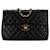 Schultertasche Chanel Maxi XL Classic aus schwarzem Lammleder mit einfacher Klappe  ref.1443677