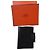 Hermès Cubierta de agenda de cuero negro.