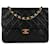 Borsa a flap singolo in pelle di agnello trapuntata Chanel in oro 24K Nero Tela  ref.1559050