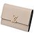 Portefeuille compact tri-fold Capucines de Louis Vuitton