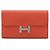 Cartera bi-fold larga Constance de Hermès en rosa claro