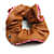 Silk In Hermès Scrunchie in pelle e seta dorata Hermes D'oro