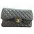 2.55 Portacarte Chanel Jumbo in pelle caviar nero e blu
