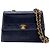 Chanel Bolsa transversal trapezoidal de couro preto com quilt vintage
