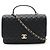 Bolsa de mão Chanel em couro de cordeiro matelassé com marca Coco Preto