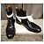 Botines Balenciaga de charol negro y blanco - vista 2