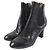 Botas de cuero con gomas Louis Vuitton Monogram Negro
