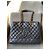 Borsa Chanel GST Grand Shopping Tote in pelle caviar nera - vista 10