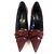 Dolce & Gabbana presenta queste sexy décolleté classiche a punta in pelle scamosciata e pelle di serpente bordeaux con fiocco. Bordò - vista 5