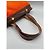 Hermès La sua borsa a spalla in pelle e tela arancione Marrone - vista 11