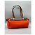 Hermès La sua borsa a spalla in pelle e tela arancione Marrone - vista 2