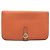 Pochette in pelle Taurillon Clémence Dogon GM di Hermès Arancione