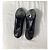 Timeless Schwarze Leder-Pumps mit CC-Kettendetail von Chanel - Ansicht 14