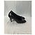 Timeless Schwarze Leder-Pumps mit CC-Kettendetail von Chanel - Ansicht 8