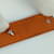 Bracelet en cuir orange Swift d'Hermès  - vue 6