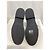 Bota flat Britt da Michael Kors em couro preto - vista 11