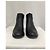 Bota flat Britt da Michael Kors em couro preto - vista 9