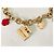 Delizioso bracciale DOLCE & GABBANA acciaio dorato charms rossetto e altri - vista 4