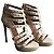 Décolleté Alaïa in pelle beige e nera