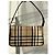 Nuova borsa baguette Burberry beige con etichetta