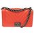 BORSA CHANEL BOY MEDIA IN PELLE CHEVRON CORALLO CON TRACOLLA Rosa