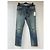 Jeans slim desbotado e rasgado em denim azul da Saint Laurent - vista 6