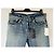 Jeans slim desbotado e rasgado em denim azul da Saint Laurent - vista 7