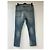 Jeans slim desbotado e rasgado em denim azul da Saint Laurent - vista 8